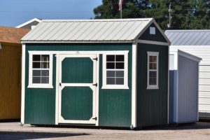 Painted Side utility building in City State by name of business