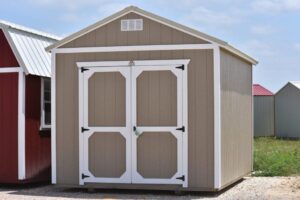 This is a painted utility building for sale or rent to own in