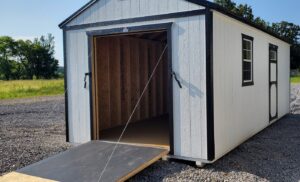 Extra Height Work shop style garage utility building with 7' ramp for easy access and exit for sale or rent to own in 